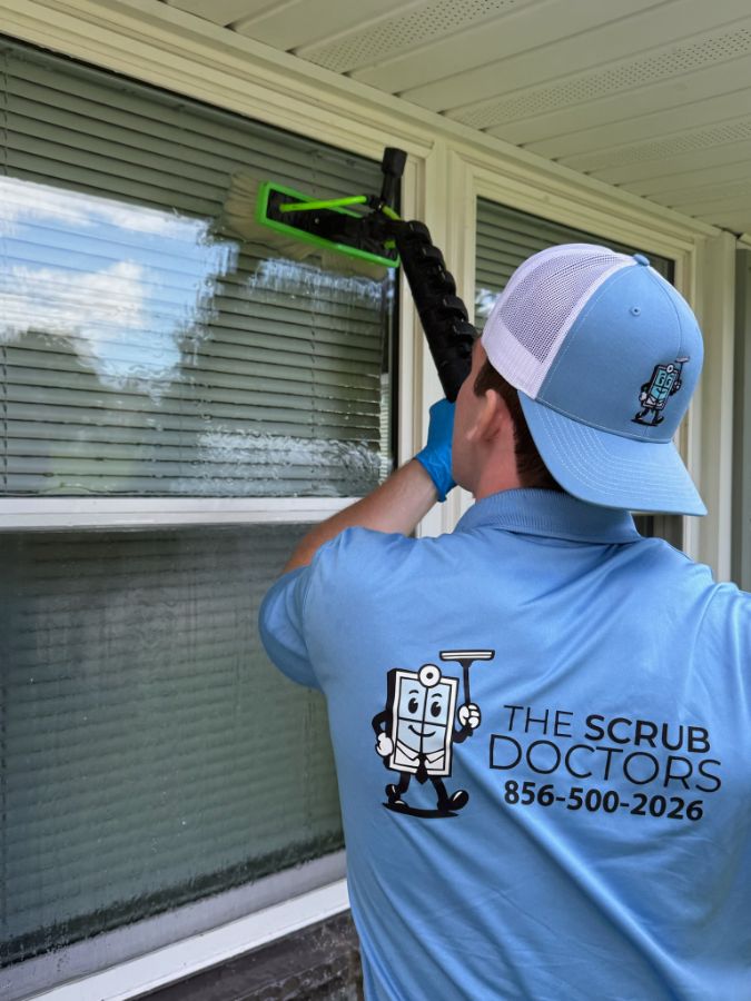 Exterior window cleaning with a pure-water-fed pole