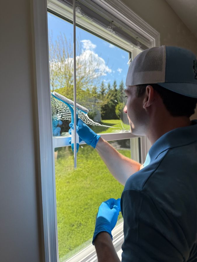 Squeegeeing clean glass