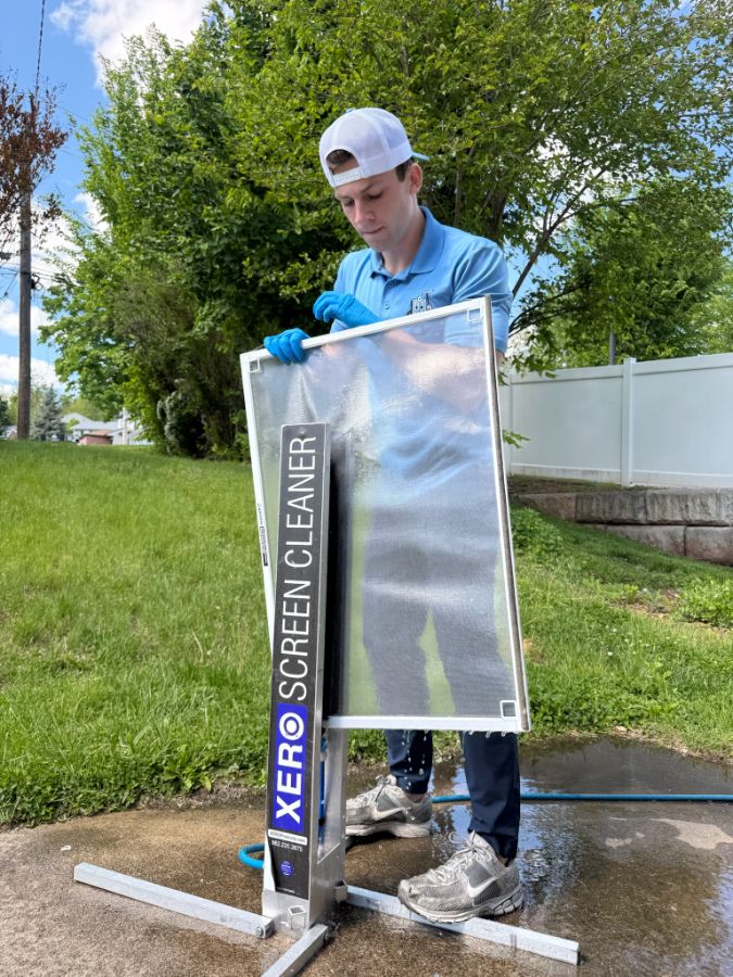 Removing and cleaning a window screen
